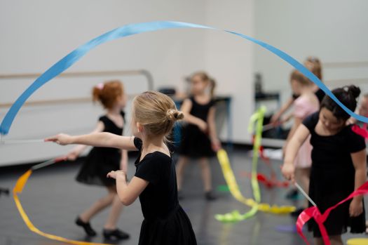 Children dancing with ribbons